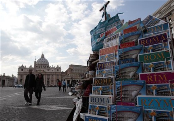 Guidebooks to Rome in different languages are displayed March 22 in front of St. Peter's Square at Vatican City in Rome. The Vatican travel agency for pilgrimages said prices on rooms might tumble in the coming weeks because predictions of upward of 1 million people pouring into the city for Pope John Paul II's beatification ceremony could scare off potential hotel guests.